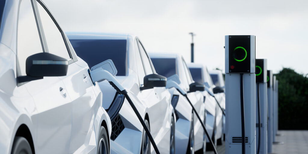 Row of electric cars all charging